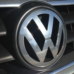 VW badge close up at Waterfall VW and Audi service centre in Wimbledon
