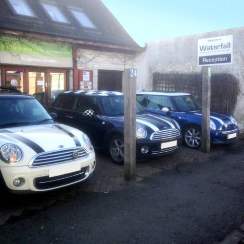 3 MINIs outside the reception of Waterfall Garage in Wimbledon 